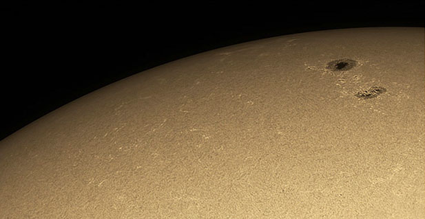 photo of the sun and sunspots with a daylight filter