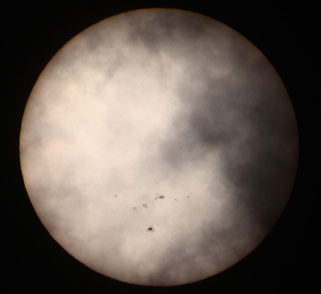 sun and sunspots on a cloudy day - january 2012 - dslr - white filter